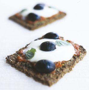 Basil, olive and mozzarella pizzas